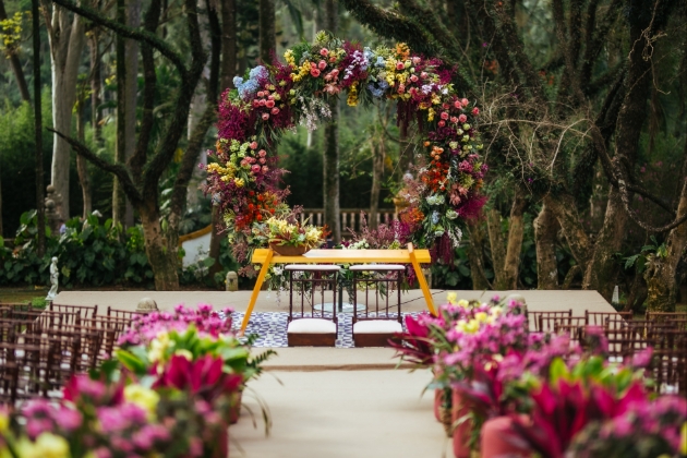 ceremony set up with floral backdrop