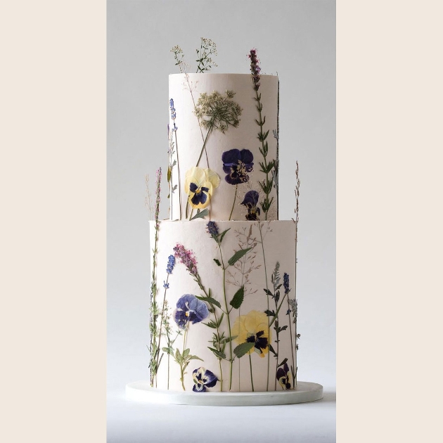 White pressed floral wedding cake