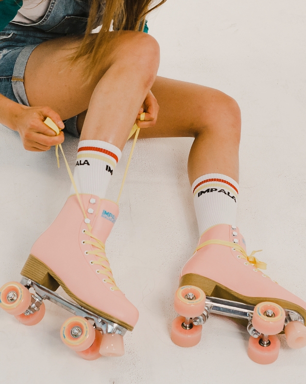 70s-inspired pink and yellow roller boots from Impala Skate