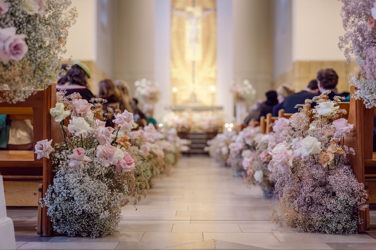 ceremony aisle with big floral displays